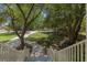 A view from the top of the stairs showing the driveway, sidewalk, and the lush front yard of the home at 3021 Rushland Mews, Johns Island, SC 29455