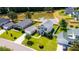 Aerial view of homes in a lakeside community, showcasing a tranquil pond at 303 Seneca River Dr, Summerville, SC 29485