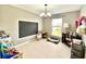 Spacious bonus room with a chalkboard wall, ample natural light, and neutral carpet at 303 Seneca River Dr, Summerville, SC 29485