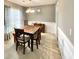 Elegant dining room featuring wainscoting, a chandelier, and neutral decor at 303 Seneca River Dr, Summerville, SC 29485