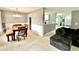 Open floor plan featuring a dining room with hardwood table set and chandelier lighting at 303 Seneca River Dr, Summerville, SC 29485