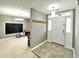 Welcoming foyer with coat hooks and view to the adjacent living spaces at 303 Seneca River Dr, Summerville, SC 29485