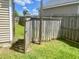 A wooden gate in the backyard fence offers convenient access to the yard or nearby areas at 303 Seneca River Dr, Summerville, SC 29485