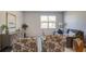 The living room is spacious with large windows, providing a bright and inviting atmosphere at 311 Willow Run Dr, Summerville, SC 29486