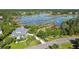 Aerial view of the house surrounded by lush greenery, and a network of waterways at 314 Commonwealth Rd, Mount Pleasant, SC 29466