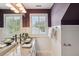 Bathroom featuring granite countertop, vessel sink, and abundant natural light at 314 Commonwealth Rd, Mount Pleasant, SC 29466