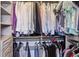 Organized walk-in closet showing ample storage space for hanging clothes, drawers, and shelves at 314 Commonwealth Rd, Mount Pleasant, SC 29466