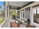 Relax on this inviting screened porch with comfortable seating and space for grilling at 314 Commonwealth Rd, Mount Pleasant, SC 29466