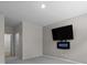 Bedroom with a wall-mounted TV and access to the bathroom at 318 Bering Ln, Summerville, SC 29486