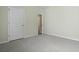 Bedroom with neutral paint, neutral carpet, and a white door at 318 Bering Ln, Summerville, SC 29486