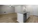 Open concept kitchen with stainless steel dishwasher, granite countertop and hardwood floors at 318 Bering Ln, Summerville, SC 29486