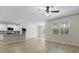 Open-concept living room and kitchen with granite countertops and wood floors at 318 Bering Ln, Summerville, SC 29486
