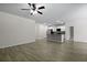 Living room and kitchen with white cabinets and stainless appliances at 318 Bering Ln, Summerville, SC 29486