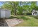 Large backyard with a shed, mature trees, and ample space for gardening or entertaining at 323 Millcreek Dr, Charleston, SC 29407