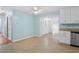 Open dining area with tile flooring and view to another living space at 323 Millcreek Dr, Charleston, SC 29407