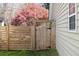 Backyard gate in the wooden fence provides convenient access to the backyard at 350 Arlington Dr, Charleston, SC 29414