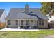 Back of house features a large backyard with an expansive patio, perfect for outdoor enjoyment at 350 Arlington Dr, Charleston, SC 29414