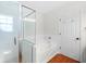 Bathroom featuring a glass shower, soaking tub, and stylish tile work at 350 Arlington Dr, Charleston, SC 29414