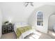 Bright bedroom featuring an arched window and neutral decor creating a cozy atmosphere at 350 Arlington Dr, Charleston, SC 29414