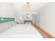 Spacious bedroom featuring a view into the bathroom and stylish furnishings at 350 Arlington Dr, Charleston, SC 29414