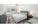 Bright bedroom featuring hardwood floors, plush rug, and a large window at 350 Arlington Dr, Charleston, SC 29414