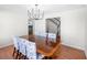 Elegant dining room features a chandelier, large table, and blue patterned chairs at 350 Arlington Dr, Charleston, SC 29414