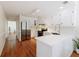 Bright kitchen with stainless steel refrigerator, modern appliances, and white cabinets offers a clean, updated look at 350 Arlington Dr, Charleston, SC 29414
