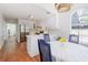 Bright kitchen with stainless steel appliances, white cabinets and eat-in dining area near window at 350 Arlington Dr, Charleston, SC 29414