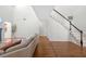 Open living room with hardwood floors, staircase, and natural light at 350 Arlington Dr, Charleston, SC 29414