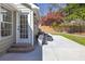 A concrete patio with outdoor seating and a fire pit in a fenced backyard is ideal for outdoor entertaining at 350 Arlington Dr, Charleston, SC 29414