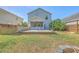 Spacious backyard with deck, screened porch, and potential for outdoor activities at 3661 Locklear Ln, Mount Pleasant, SC 29466