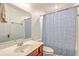 Bathroom featuring a mirror, vanity, toilet, and a shower with blue patterned shower curtain at 3661 Locklear Ln, Mount Pleasant, SC 29466