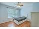 Bedroom boasts natural light, hardwood floors, and a single bed with storage drawers at 3661 Locklear Ln, Mount Pleasant, SC 29466