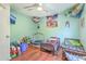 This colorful bedroom features hardwood floors, two twin beds, and ample toys at 3661 Locklear Ln, Mount Pleasant, SC 29466