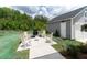Backyard patio with outdoor seating, perfect for entertaining guests, surrounded by well-maintained landscaping at 397 Woodgate Way, Summerville, SC 29485