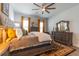 Cozy bedroom with soft lighting, tasteful decor, and comfortable furnishings at 397 Woodgate Way, Summerville, SC 29485
