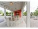 Inviting outdoor seating area with modern tables and chairs, perfect for enjoying a meal at 397 Woodgate Way, Summerville, SC 29485