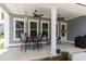 Covered patio featuring outdoor dining and seating, perfect for enjoying the outdoors in comfort at 397 Woodgate Way, Summerville, SC 29485