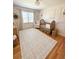 Pink Bedroom with hardwood floors, decor and wooden crib at 404 Rose Ln, Summerville, SC 29485