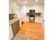 Kitchen featuring granite countertops, stainless steel appliances, and white cabinets at 404 Rose Ln, Summerville, SC 29485