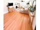 Expansive living room with hardwood flooring, modern furnishings, and neutral color scheme at 404 Rose Ln, Summerville, SC 29485