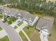 Beautiful aerial view of a community featuring well-kept homes, green spaces, and mature trees at 419 Whispering Breeze Ln, Summerville, SC 29486
