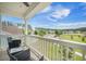 Relaxing balcony with seating and a view of the neighborhood provides an outdoor space at 419 Whispering Breeze Ln, Summerville, SC 29486