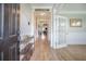 Bright entryway with hardwood floors and a view into the living room at 419 Whispering Breeze Ln, Summerville, SC 29486