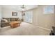 Cozy living room with carpet, a ceiling fan, and access to the outside patio via french doors at 419 Whispering Breeze Ln, Summerville, SC 29486