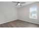 Comfortable bedroom with natural light, ceiling fan, and updated floors at 4301 Trevor St, North Charleston, SC 29420