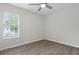 Sunlit bedroom featuring a ceiling fan and wood-look flooring at 4301 Trevor St, North Charleston, SC 29420