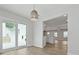Bright room adjacent to kitchen, featuring natural light and sliding glass door at 4301 Trevor St, North Charleston, SC 29420