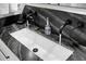 Bathroom features a white basin and stunning marble countertop, enhanced by modern black matte faucets at 4319 Sea Forest Dr, Kiawah Island, SC 29455
