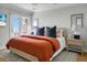 Charming bedroom with a comfortable bed, modern decor, and private balcony access at 4319 Sea Forest Dr, Kiawah Island, SC 29455